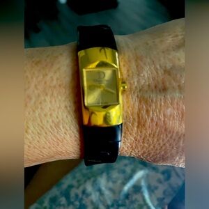 Christian Dior watch may need a new belt.